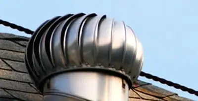 attic fan installation services with professionally installed roof ventilation unit in Bakersfield, CA