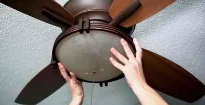 Ceiling fan repair and reinstallation on ceiling mount in Bakersfield, CA