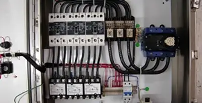Electrical panel installation with organized circuit breakers and wiring in Bakersfield, CA