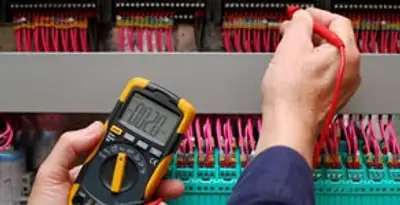 electrical service showing professional testing and troubleshooting of electrical panel by licensed electricians in Bakersfield, CA