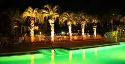 landscape lighting installation services illuminating outdoor recreational areas in Bakersfield, CA