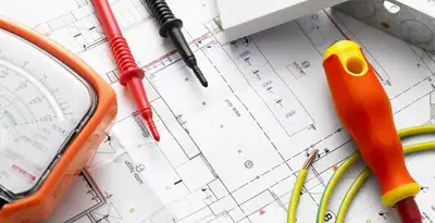licensed electrician planning and testing electrical systems using professional tools in Bakersfield, CA