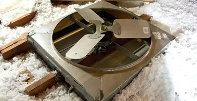 whole house fan installation services with attic-mounted ventilation unit in Bakersfield, CA